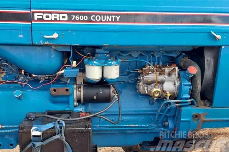 Ford County 7600 4WD With Rovic Front End Loader Tractors