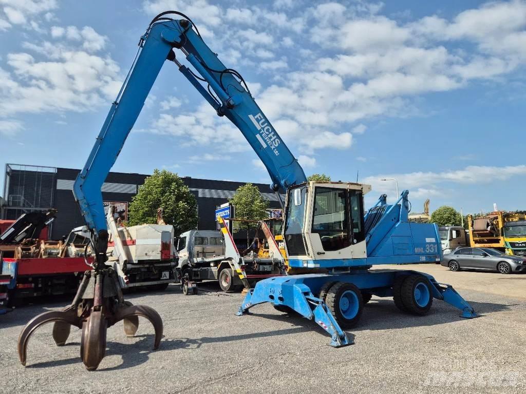 Fuchs MHL 331 Gravemaskiner for avfallshåndtering