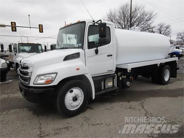 Hino 338 Slamsugere