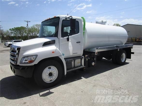 Hino 338 Slamsugere