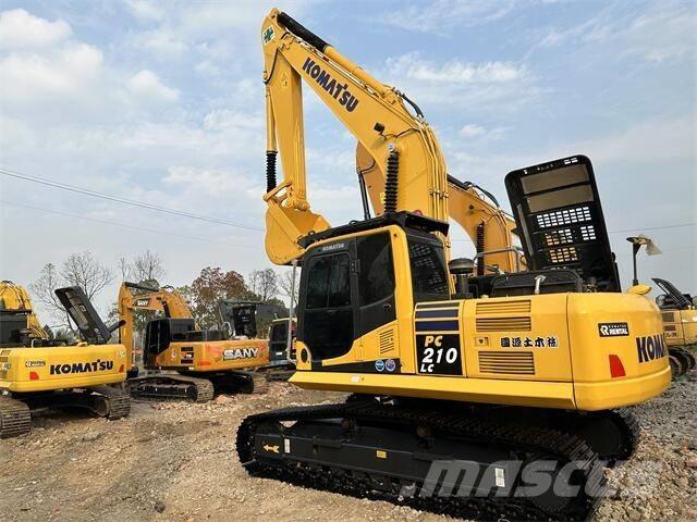 Komatsu PC 210-8 Beltegraver