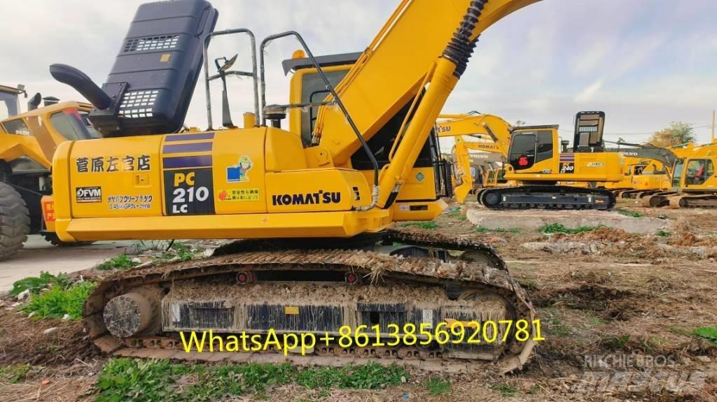 Komatsu PC 210-8 Beltegraver