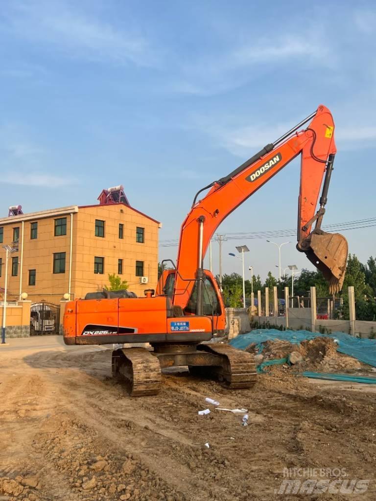 Doosan DX225LC-9C Beltegraver
