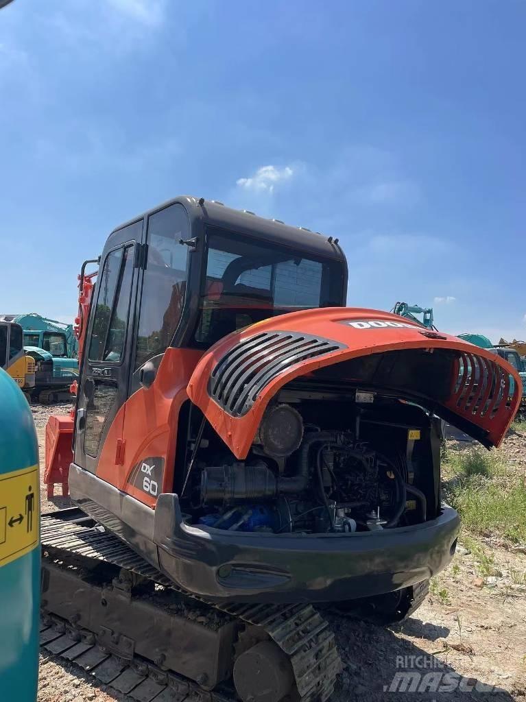 Doosan DX60 Beltegraver