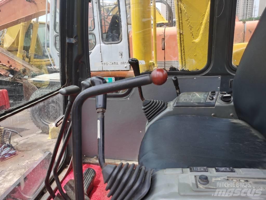 Komatsu PC60-7 Beltegraver