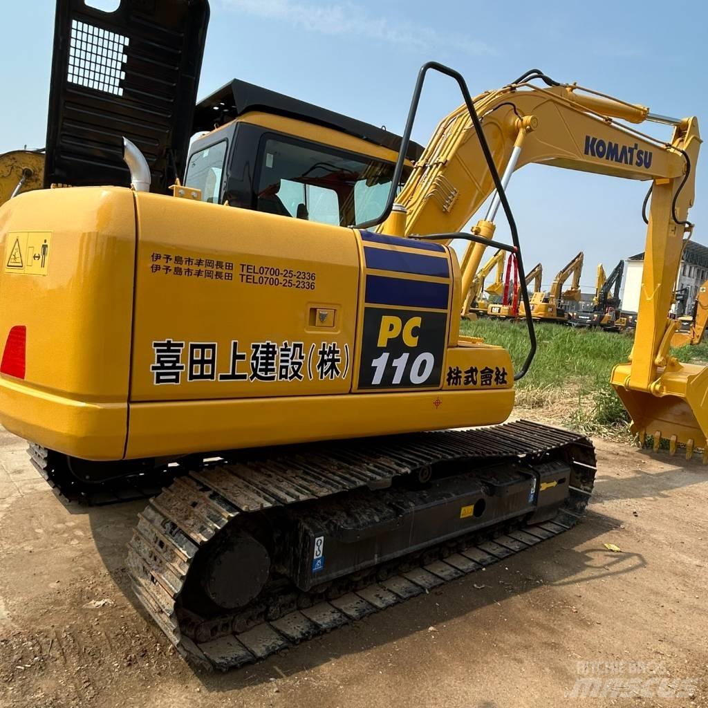 Komatsu 110 Beltegraver