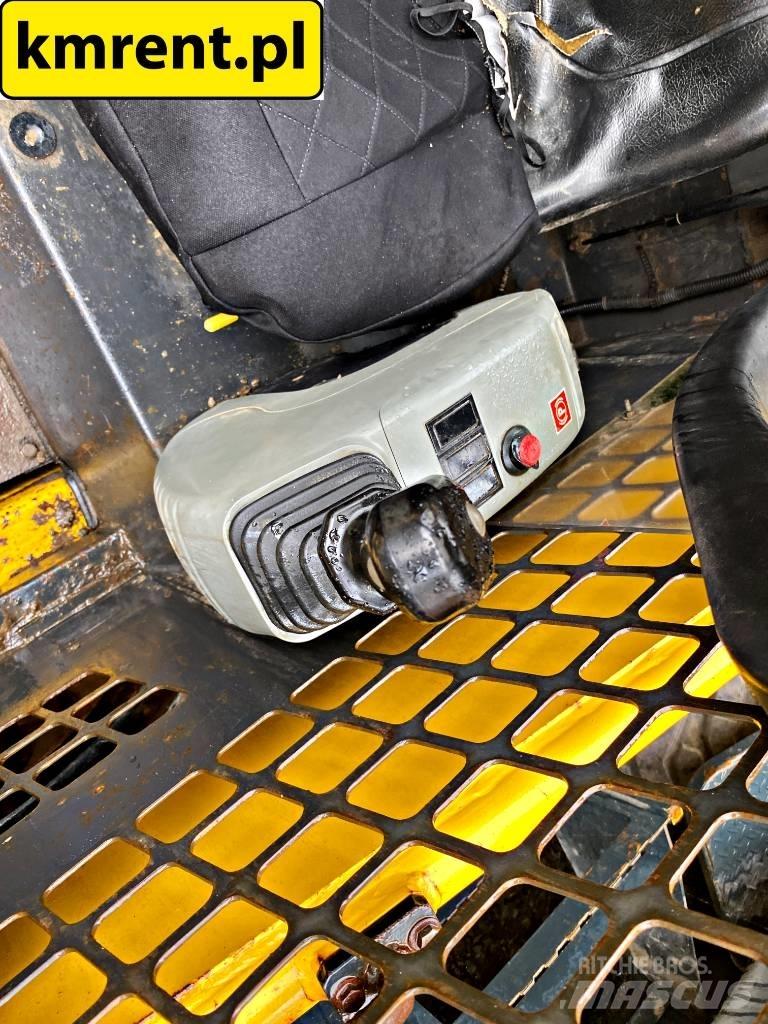 Komatsu SK 815 Kompaktlastere