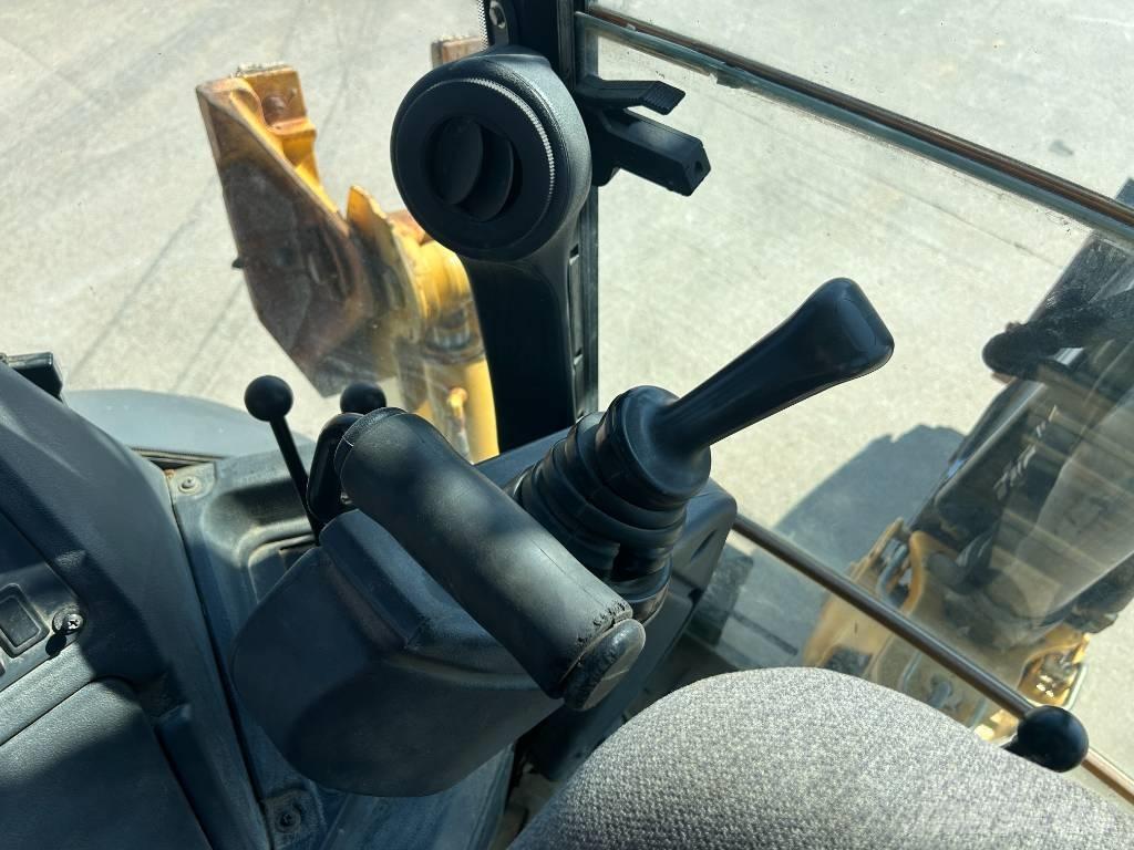 John Deere 310K Traktorgravere