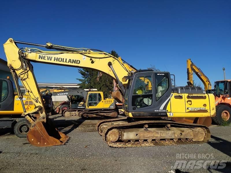 New Holland E 265 C Beltegraver