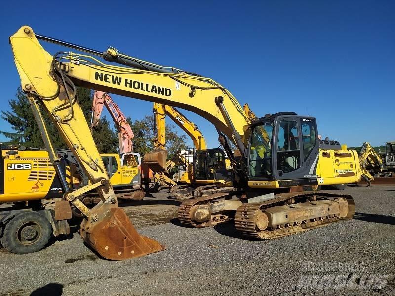 New Holland E 265 C Beltegraver