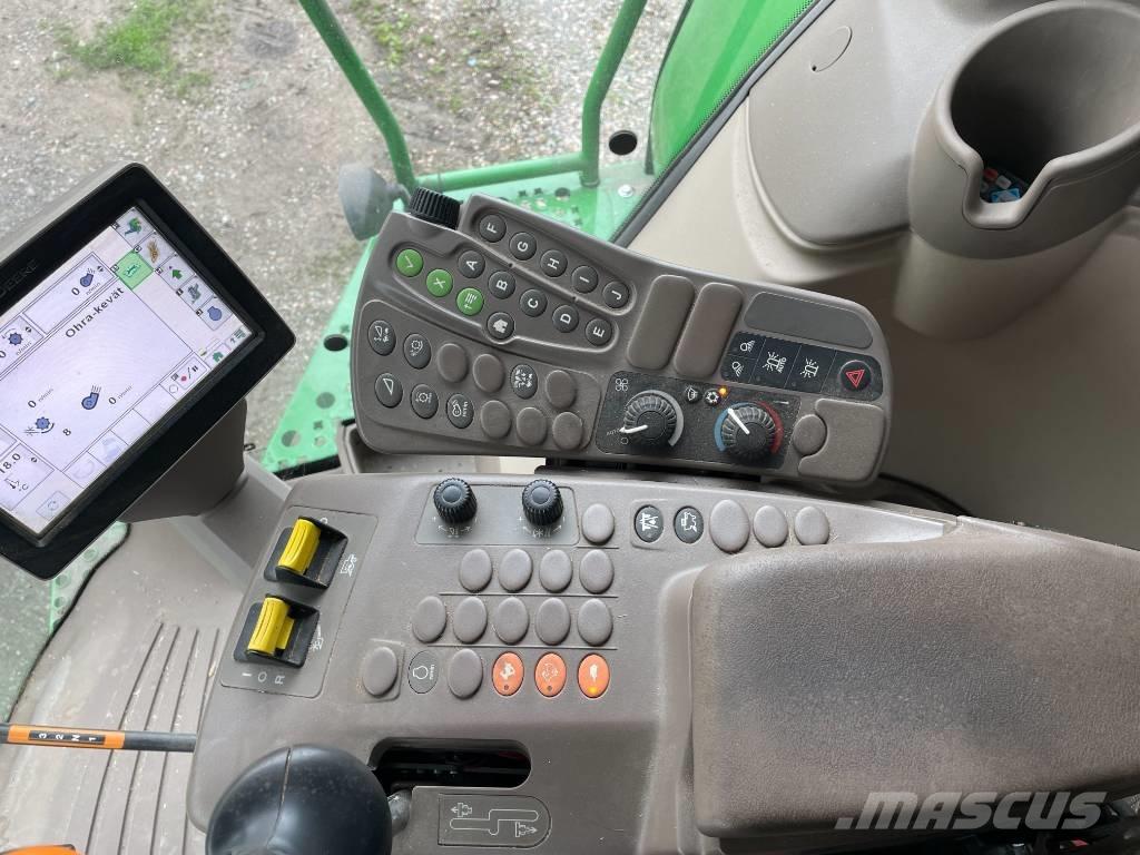 John Deere W540 Skurtreskere