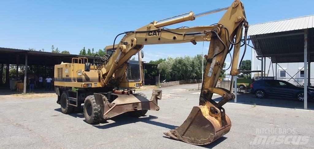 CAT 214 B Hjulgravere