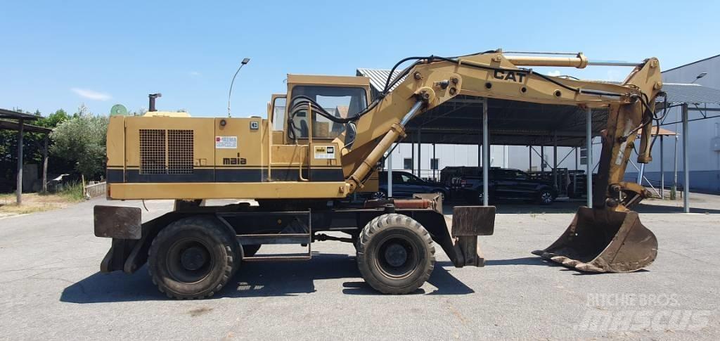 CAT 214 B Hjulgravere