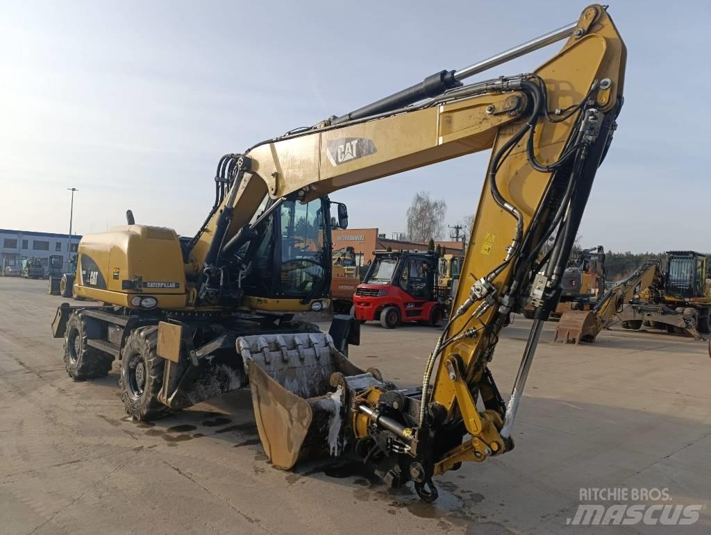 CAT M 313 D Hjulgravere