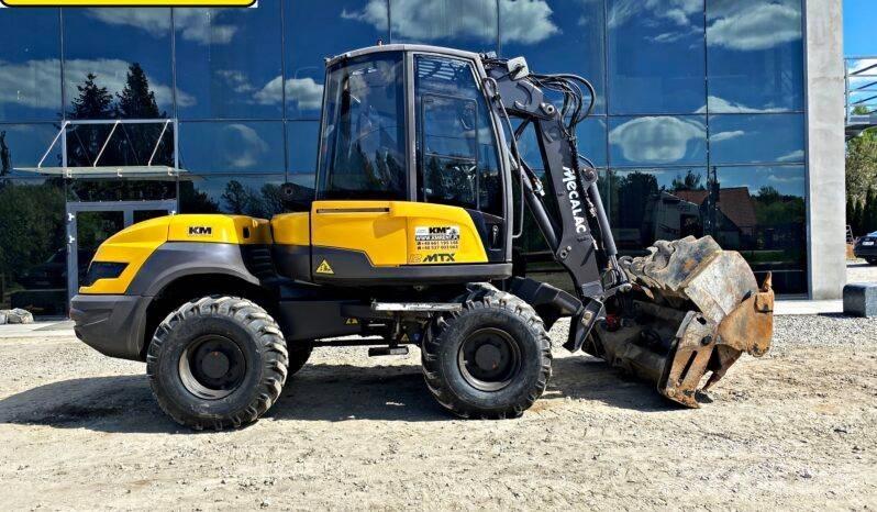 Mecalac 12 M TX Traktorgravere
