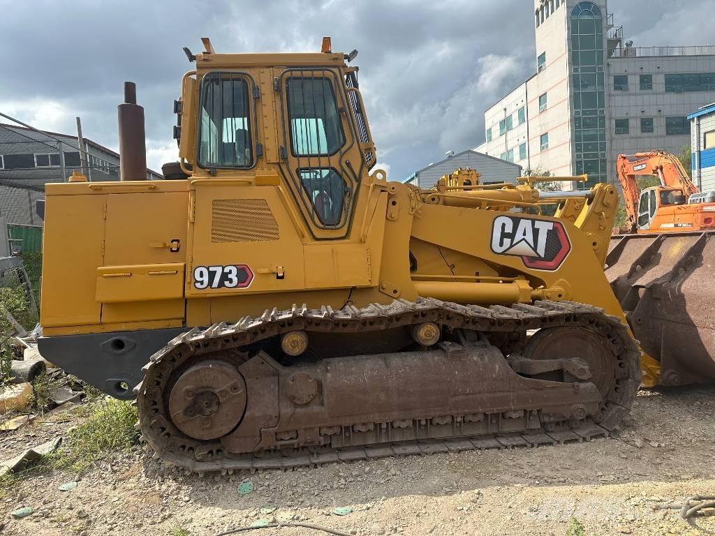CAT 973 Beltelastere