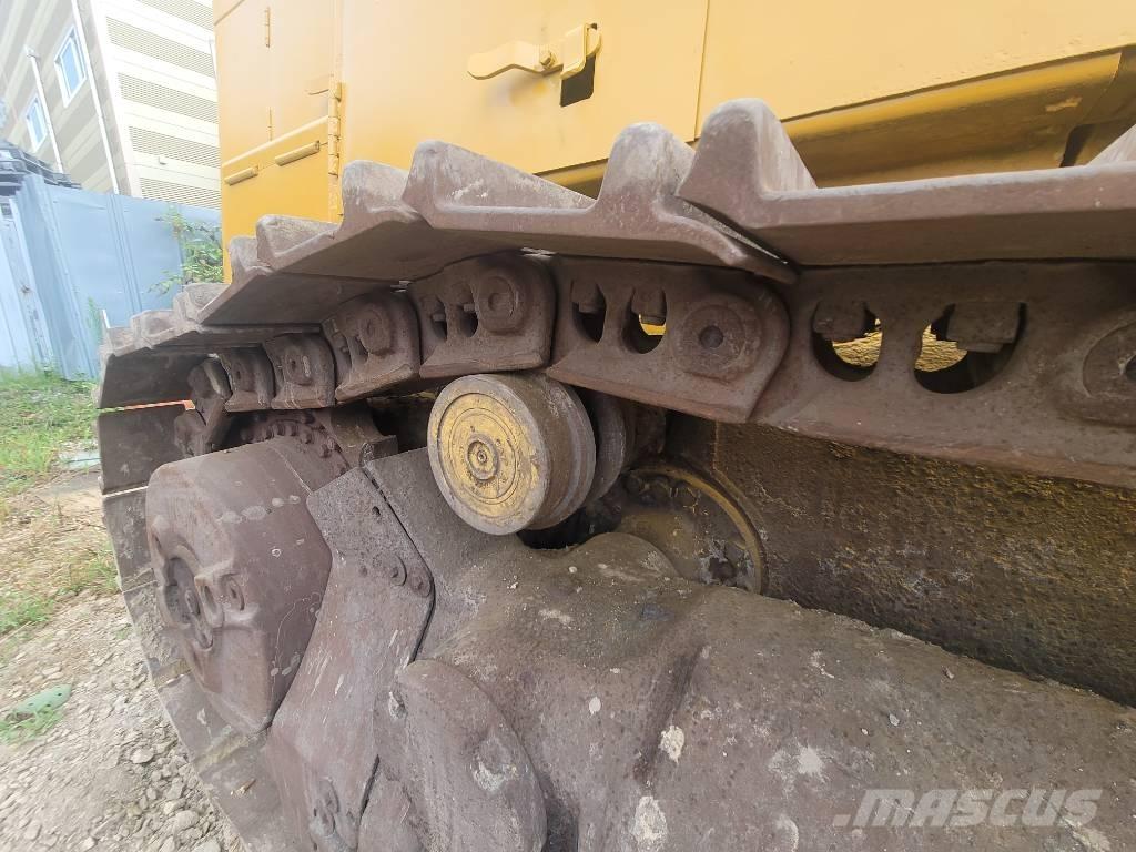 CAT 973 Beltelastere