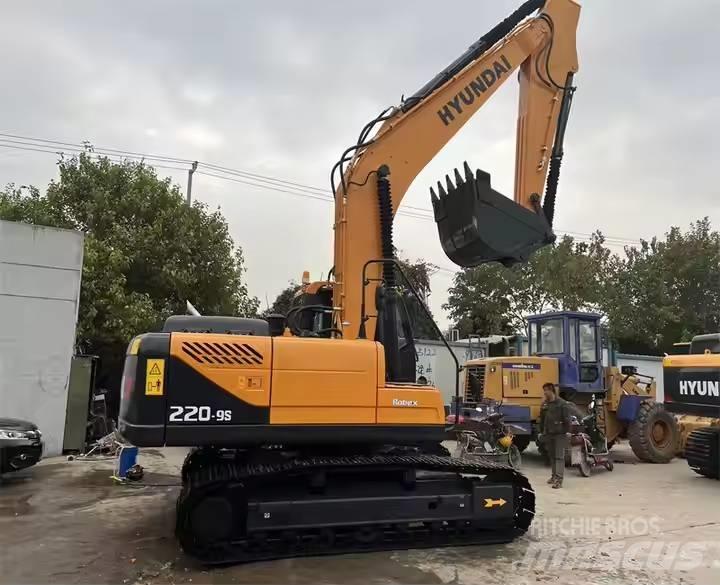 Hyundai R220-9S Beltegraver