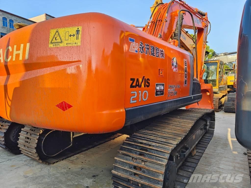 Hitachi ZX 210 Beltegraver