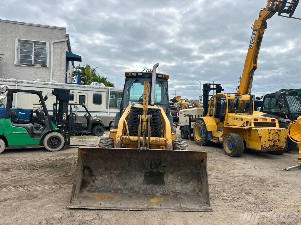 John Deere 310 E Traktorgravere
