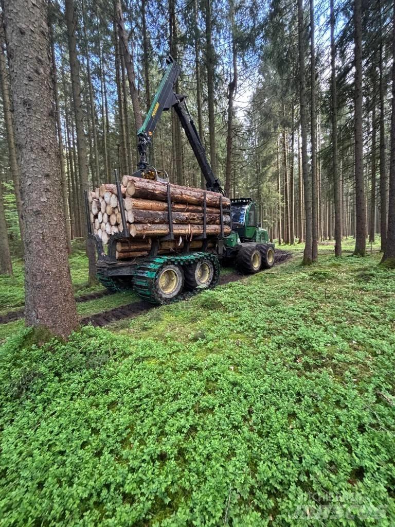 John Deere 1110E Lassbærere