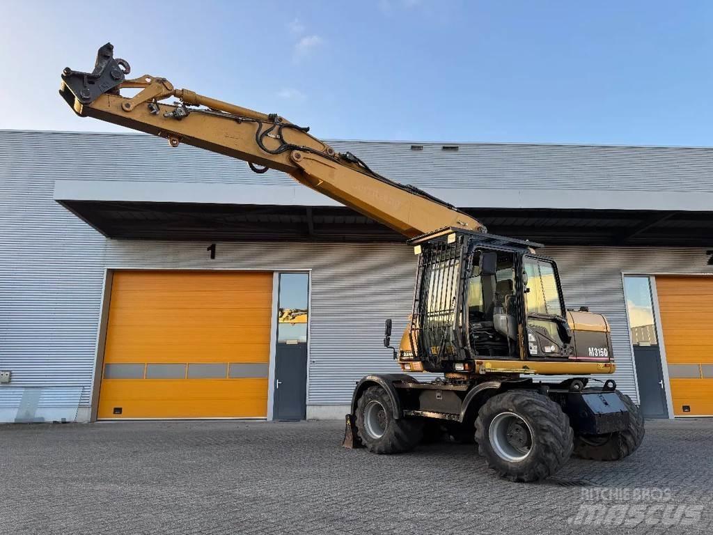 CAT M315C Hjulgravere