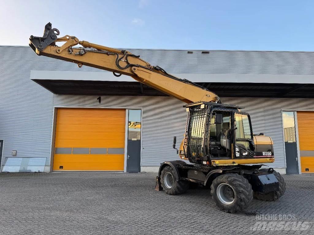 CAT M315C Hjulgravere