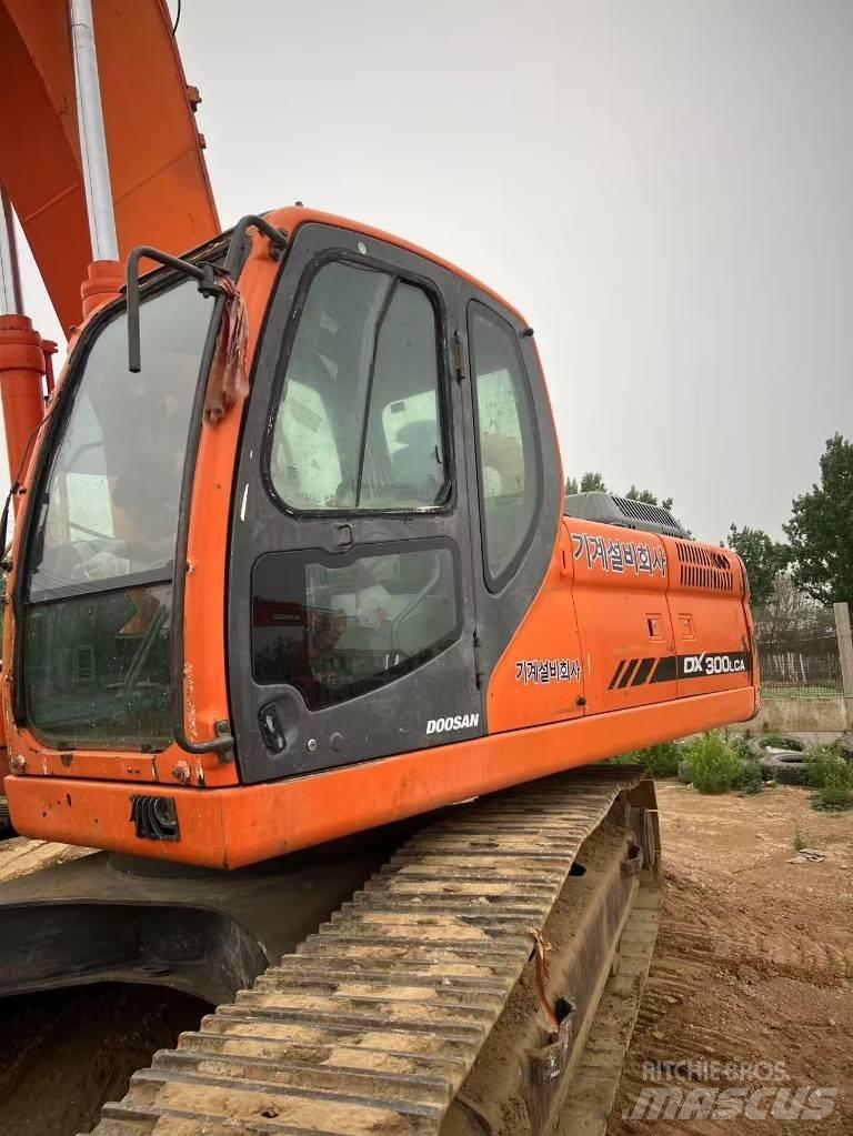 Doosan DX300LCA Beltegraver