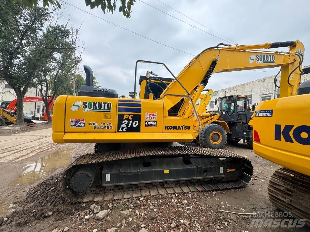 Komatsu PC 210 LC-8 Beltegraver