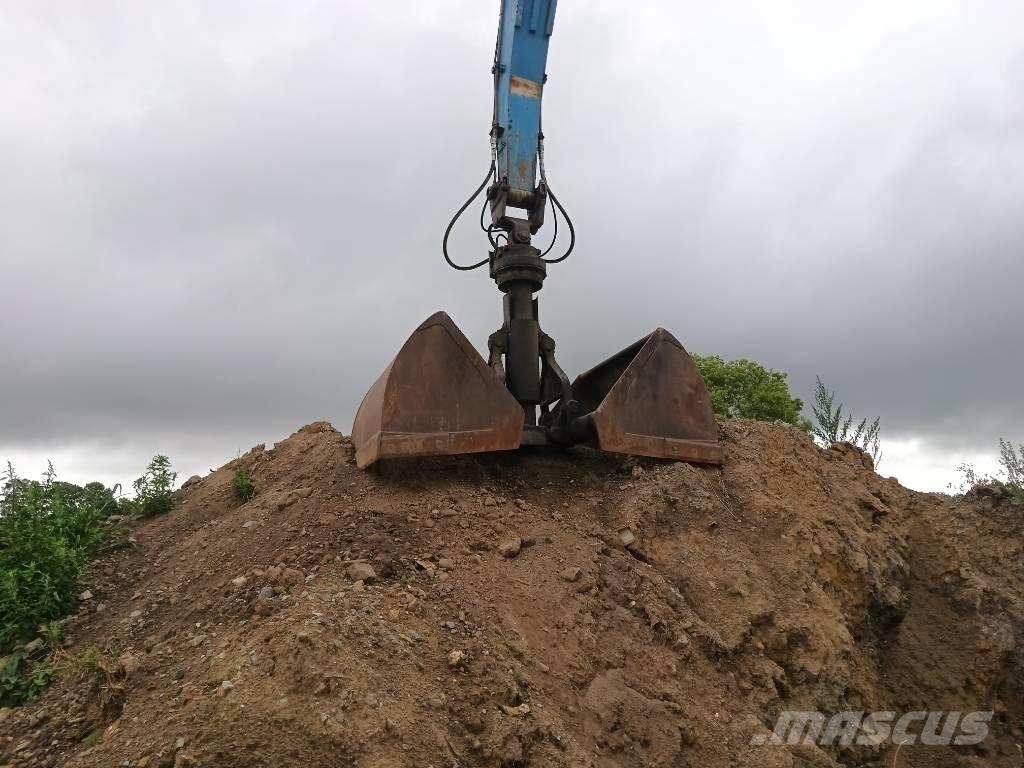 Fuchs MHL 360 Gravemaskiner for avfallshåndtering