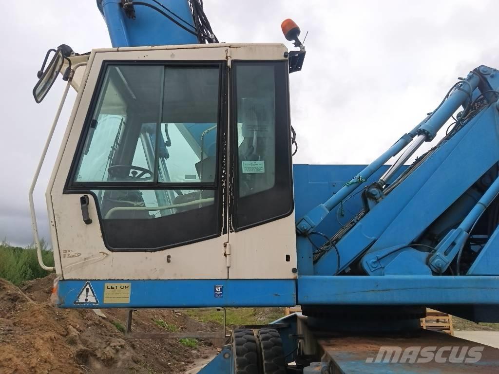 Fuchs MHL 360 Gravemaskiner for avfallshåndtering
