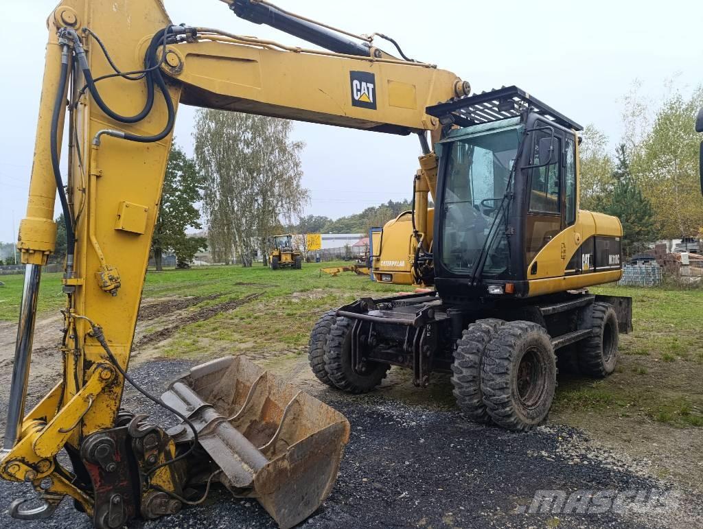 CAT M 318 C Hjulgravere