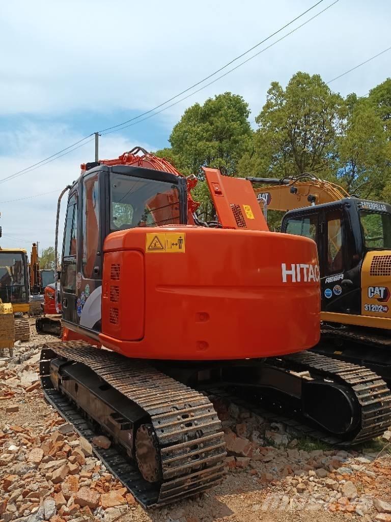 Hitachi ZX 135 Beltegraver