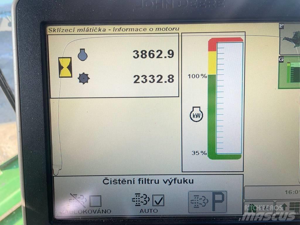 John Deere T 670 i Skurtreskere