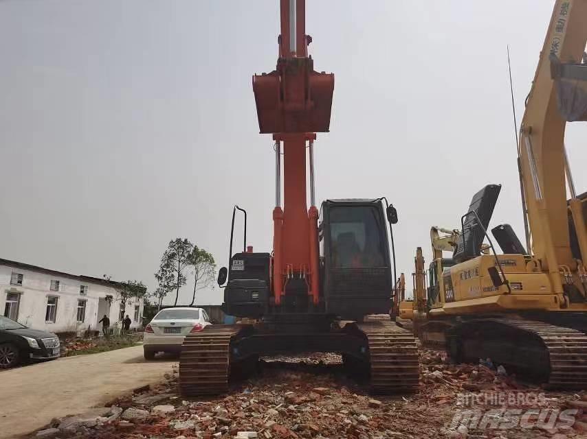 Hitachi ZX 210 Beltegraver