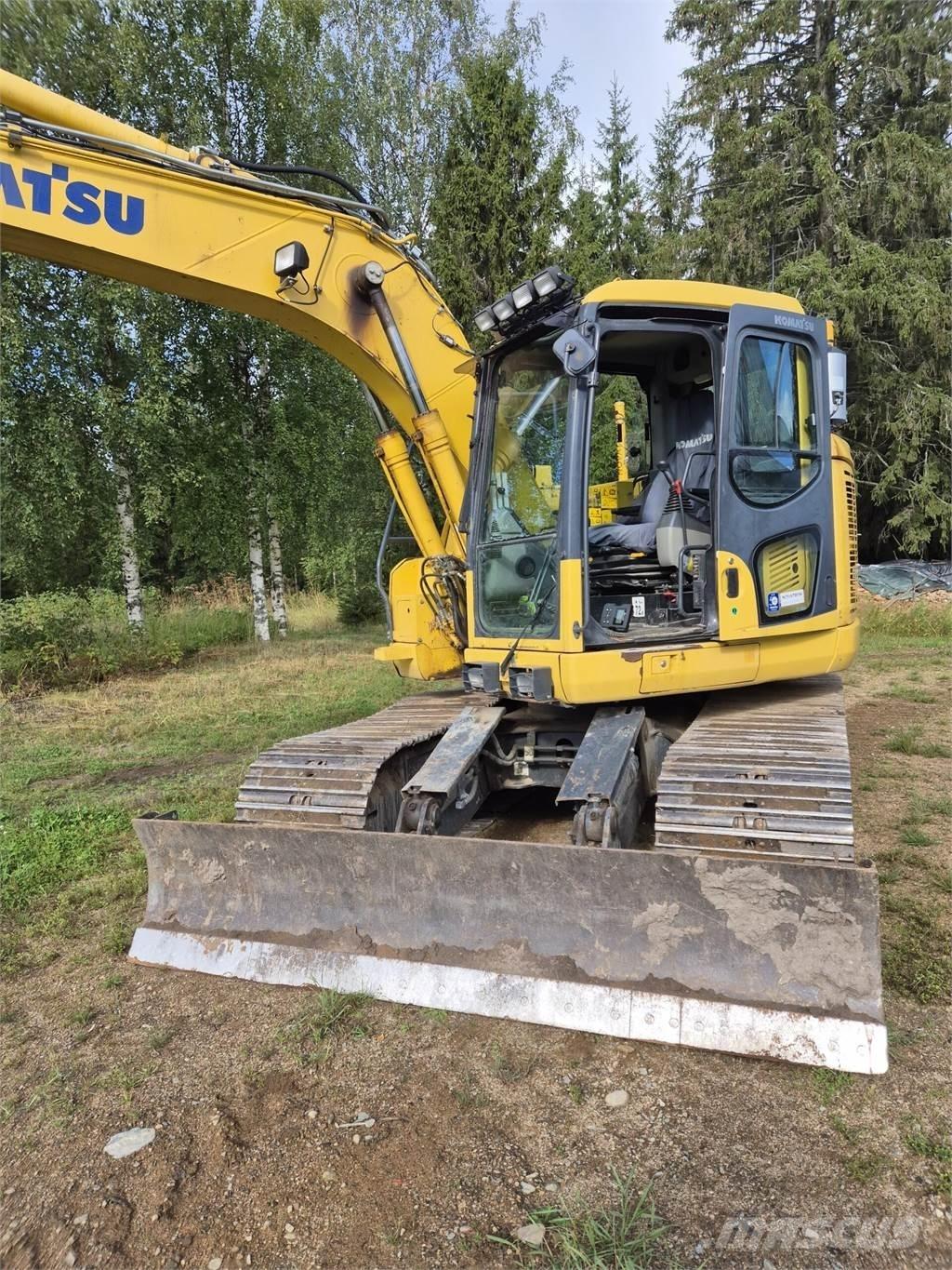 Komatsu PC138 US Beltegraver