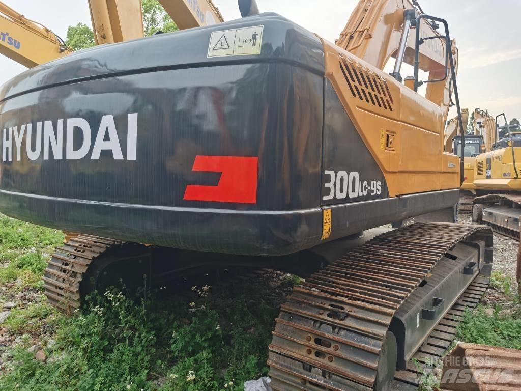 Hyundai R 300LC-9S Beltegraver
