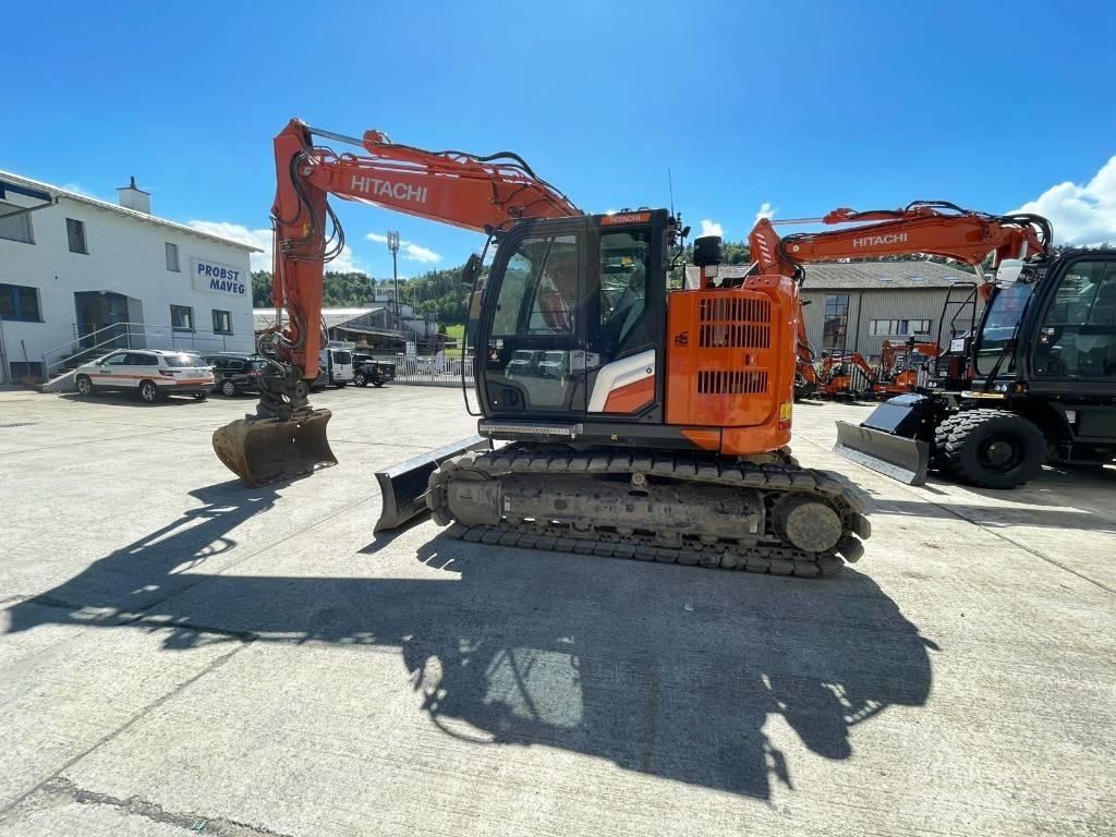 Hitachi ZX135US Beltegraver