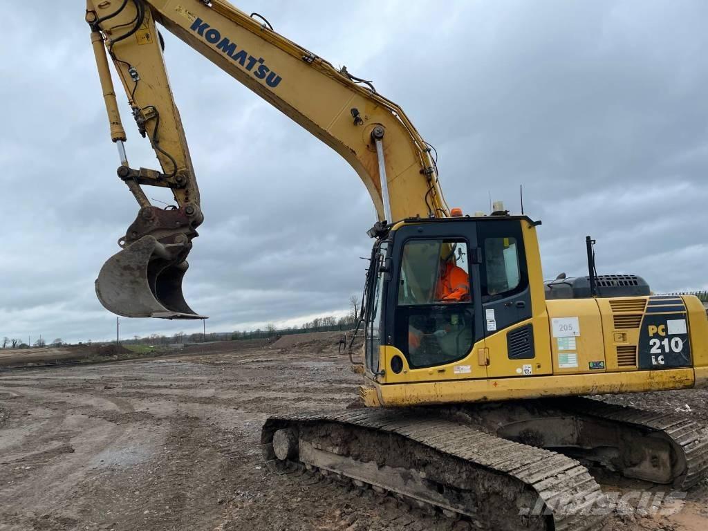 Komatsu PC210LC-8 Beltegraver