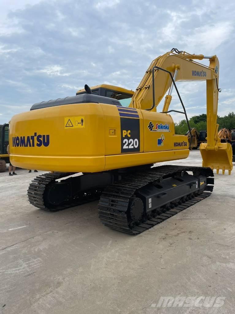 Komatsu pc220-7 Beltegraver