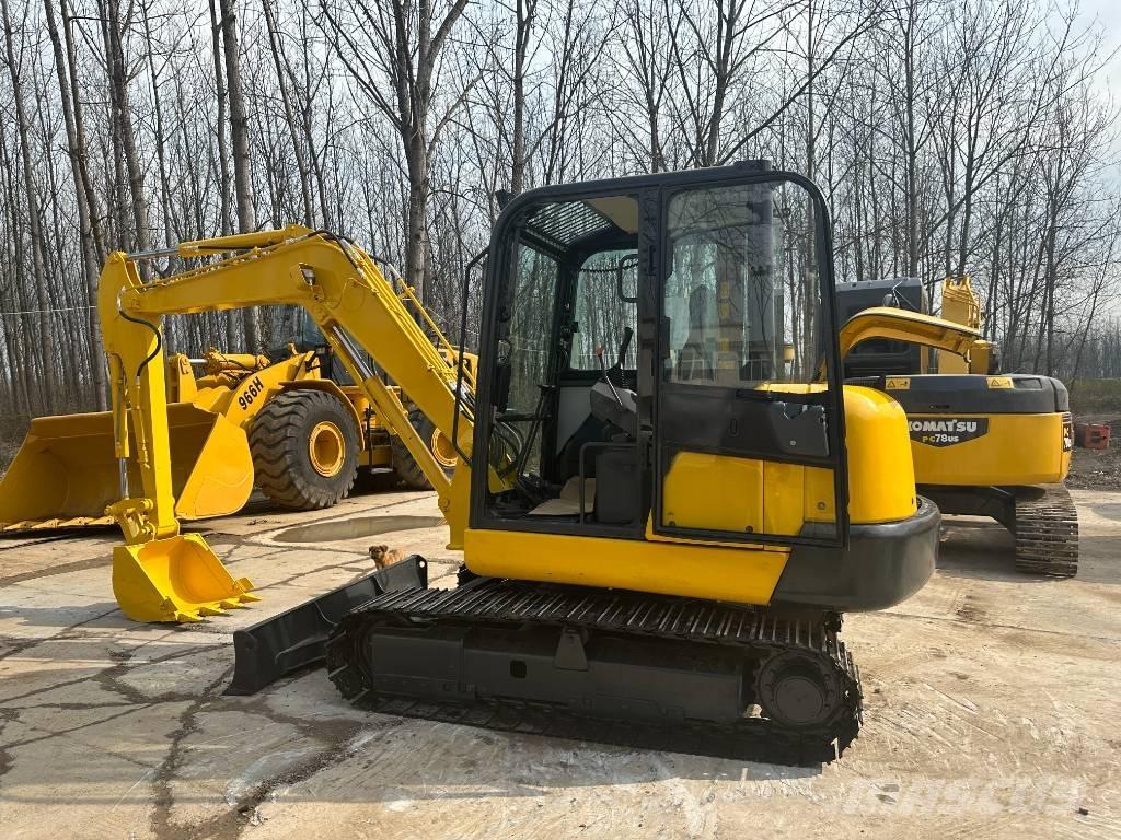 Komatsu PC56-7 Beltegraver