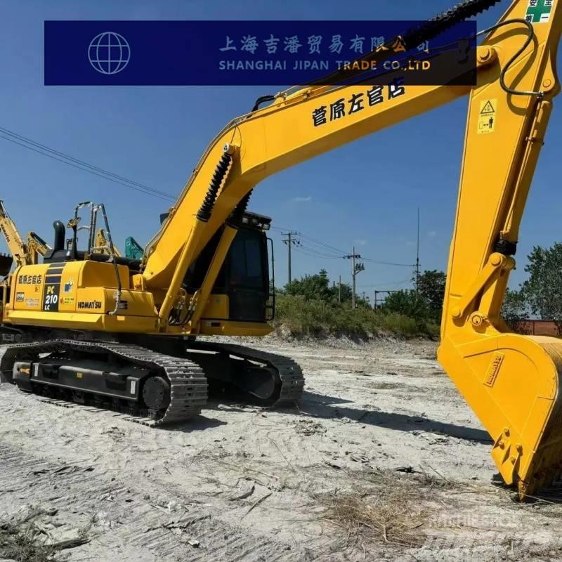 Komatsu PC 210 Beltegraver