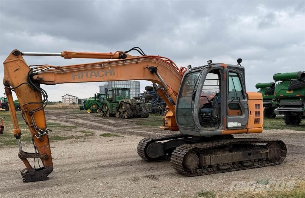 Hitachi ZX135US Beltegraver