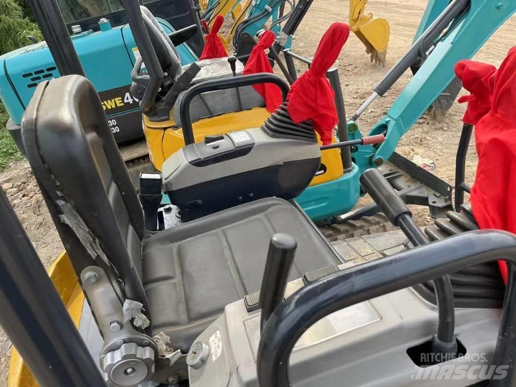 Komatsu PC18 Beltegraver