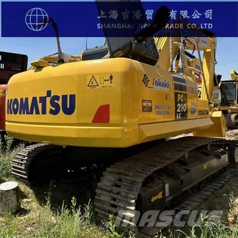 Komatsu PC 210 Beltegraver