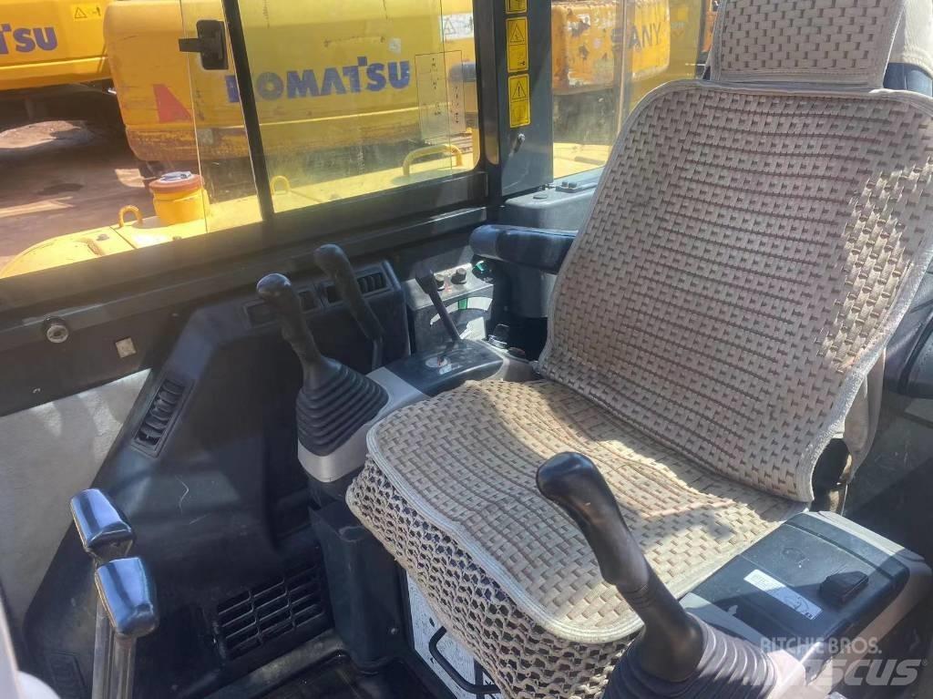 Komatsu PC56 Beltegraver
