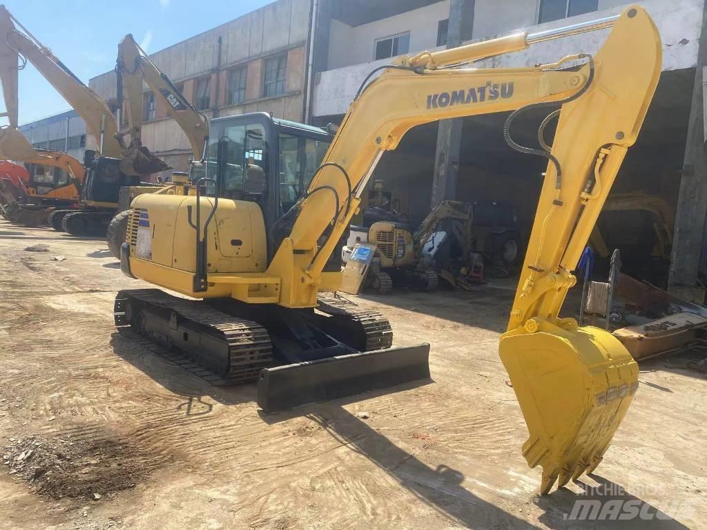 Komatsu PC56 Beltegraver