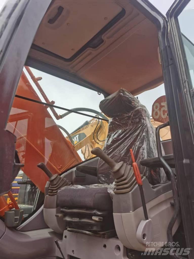 Hitachi ZX 210 Beltegraver