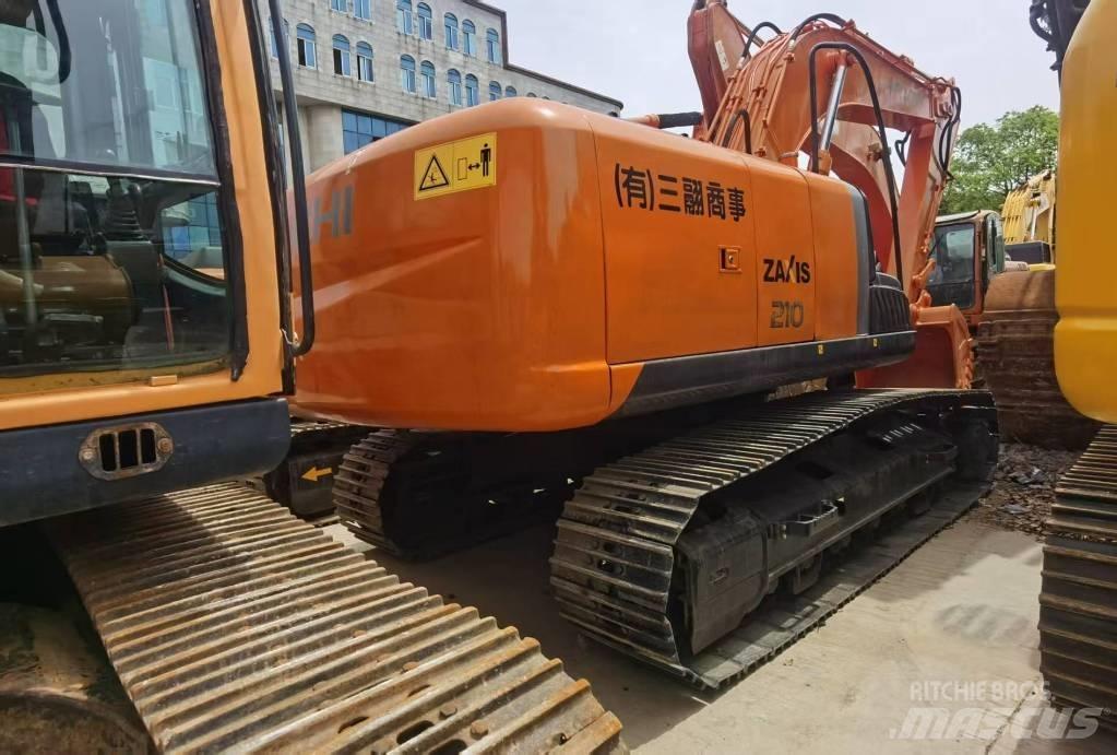 Hitachi ZX 210 Beltegraver