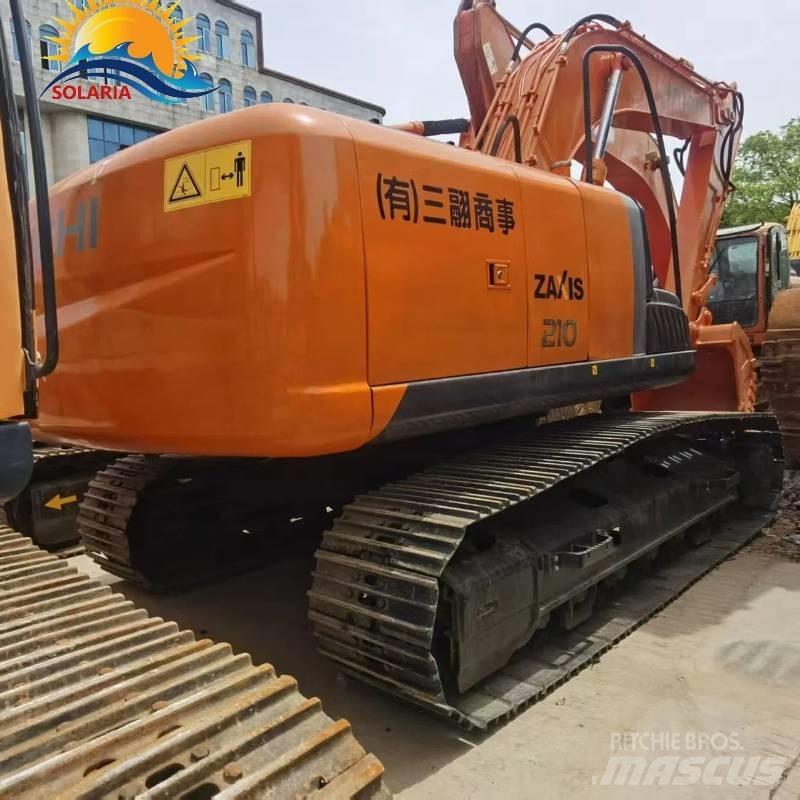 Hitachi ZX 210 Beltegraver